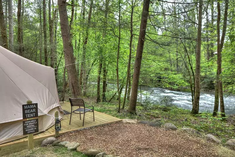 Exterior of bell tent by the river in Gatlinburg