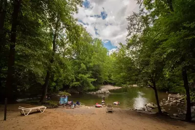 Campers enjoy swimming at the Greenbrier Campground's Flint Rock Swimming Hole.