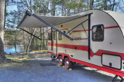 rv set up near a creek