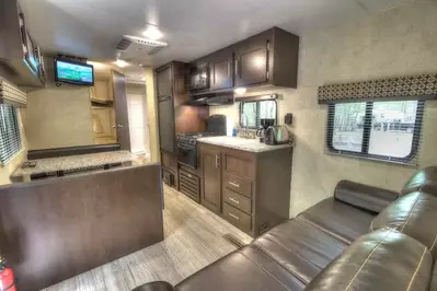 sitting area and kitchen in a camper