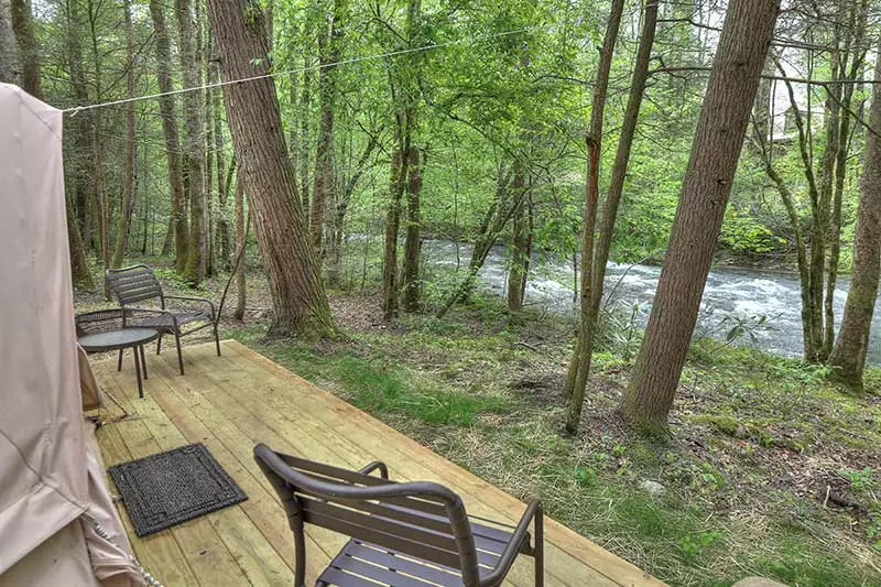 tent near a creek