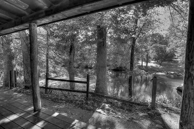 Black and white photo of the Litle Pigeon River at Greenbrier Campground in the Smoky Mountains.