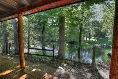 Stunning view of the Little Pigeon River from the Flint Rock Cabin at Greenbrier Campground.