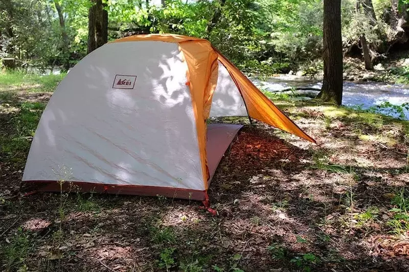 A tent by the river at Greenbrier Campground in the Smoky Mountains.