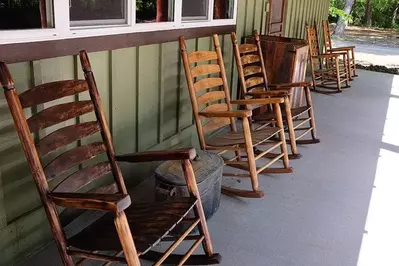 Rocking chairs in a line at Greenbrier Campground.