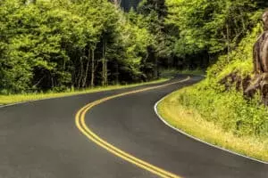 windy road cutting through the Smoky Mountains